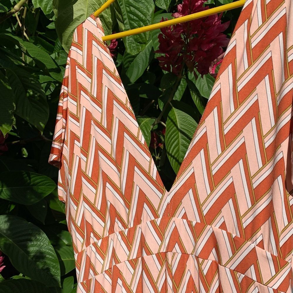 SOLD••Geometric print jumpsuit with tiered flowy pants~
